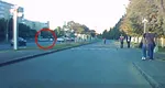 Accident teribil. Un BMW a spulberat, pe contranses, un poliţist pe motocicletă VIDEO