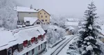 Peisaj de iarnă în România înainte de Paşte. Ninge în toată regula la munte