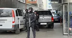 Percheziţii DIICOT într-un dosar care vizează o grupare care a retras ilegal circa 14 milioane de euro de la o bancă din România