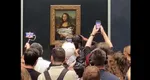 Gest revoltător: Mona Lisa, mânjită cu mâncare, la Muzeul Luvru (VIDEO + FOTO)