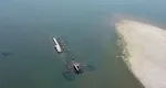 Dunărea, la cote alarmante. Debitul a scăzut atât de mult încât se văd epavele vapoarelor eşuate pe fluviu în Al Doilea Război Mondial