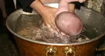 Bebelușul din Suceava decedat după botez a avut o moarte violentă, prin aspirare de apă / Raportul legiștilor