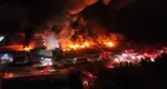 Un tren care transporta o substanţă chimică a deraiat şi a provocat un incendiu uriaş VIDEO