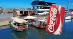 Cât trebuie să scoți din buzunar dacă vrei să bei o Coca Cola în Portul Tomis. Prețurile sunt comparabile cu cele din stațiunile de lux