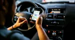 Amendă de 30.000 de lei și suspendarea permisului pentru șoferii care folosesc aplicații de navigație pe telefon