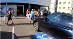 Imagini revoltătoare în parcarea unui magazin Lidl. Un șofer BMW jignește un biciclist. VIDEO