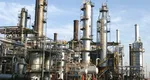 Legea care triplează impozitul pe cifra de afaceri a marilor companii petroliere la 1,5%, promulgată de Klaus Iohannis