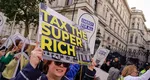 Taxa nouă cerută de întreaga comunitate internațională. Câți români ar trebui să plătească, dacă ar fi introdusă și de guvernul de la București