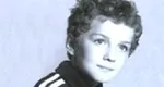 Știi cine este copilul din fotografie? Are o carieră de succes în muzică, reprezentând România la Eurovision