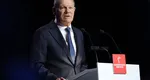 Olaf Scholz îl amenință pe Trump cu escaladarea războiului comercial! Germania e cea mai afectată după ce SUA au impus 25% taxe vamale pe mașinile din UE! Se anunță blocaj comercial total!