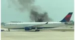 Clipe de groază pe Aeroportul din Orlando, Florida. Un avion cu 300 de pasageri a fost evacuat în urma unui incendiu devastator la motor, înainte de decolare VIDEO