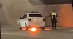 Un Logan de poliţie a luat foc în trafic, în Iaşi VIDEO