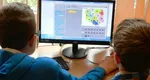 Au început înscrierile pentru achiziția de calculatoare. Condițiile pe care elevii și studenții trebuie să le îndeplinească pentru a primi vouchere de 200 de euro