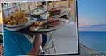 Prețurile de pe litoralul românesc îi șochează pe turiști. Cât a plătit un influencer pentru o masă la un restaurant din Mamaia
