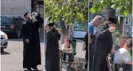 Imagini virale cu o față bisericească ce se dedă la plăceri lumești. În autogara Deva, un călugăr combate canicula cu o bere rece băută direct din butelcă și mângâie tandru pe umerii dezgoliți femeile care stau pe bănci în așteptarea microbuzelor