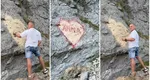 Reacții virale după ce un bărbat a scris cu graffiti pe o stâncă de pe Transfăgărășan numele iubitei: „Anna, ține-ți prostul acasă!”