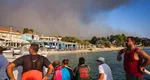 Români evacuați din Halkidiki, în șlapi și costume de baie după incendiile devastatoare