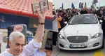 Călin Georgescu, escortat la Oradea cu un Jaguar deținut de o inspectoare ANAF. Soțul acestia a candidat din partea partidului fondat de Traian Băsescu iar acum este adept AUR
