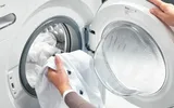 Motivul pentru care maşina de spălat are geamul curbat în interior. Cum ajută această forma la procesul de spălare
