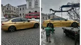 BMW de „aur” parcat neregulamentar, ridicat de poliţiştii din Iaşi. Câţi bani trebuie să plătească şoferul ca să-şi recupereze bolidul