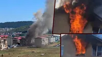 Incendiu puternic în Cluj. Ard un apartament și acoperișul blocului