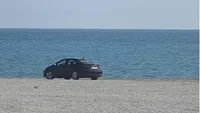 Şoferul care a intrat cu maşina pe plaja Cap Aurora a fost amendat cu 10.000 de lei