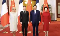 Macron îl îndeamnă pe Xi să crească investițiile chineze pentru a reduce deficitul comercial global