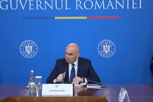 Bolojan vrea să oblige medicii să rămână în România. Specialiștii avertizează asupra riscurilor