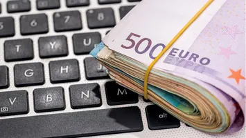 200 de euro de la stat pentru tinerii care îşi cumpără un calculator. Cine primeşte banii