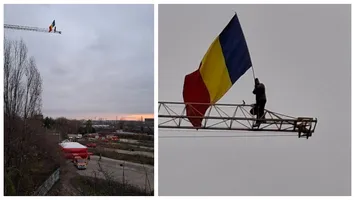 Stegarul dac sărbătorește 1 Decembrie cocoțat pe o macara din București, de unde strigă ”Turul doi înapoi!”. Echipajele de intervenție negociază cu el să coboare, a fost adusă și o saltea gonflabilă