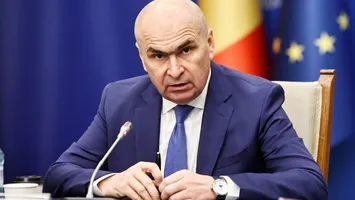 Bolojan, de neoprit când are pixul în mână. Taie sporurile bugetarilor care lucrează cu fonduri europene! ”Eliminăm plata lor din oficiu”