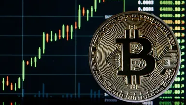 Bitcoin a atins pe cea mai mare valoare din 2021 până în prezent! Moneda a depășit 60.000 de dolari și se apropie de recordul absolut