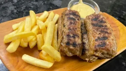 Ce au comandat românii de 1 Decembrie. Un client a plătit 1.900 de lei pe mici şi cartofi prăjiţi