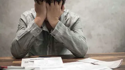 Românii care nu îşi mai pot permite plata ratelor scapă temporar de executarea silită. Când intră în vigoare legea şi cum se va putea renunţa la un credit, gratuit, în termen de 14 zile