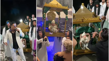 Botez faraonic la Rucăr. Micuțul Vladimir și-a făcut apariția într-un tron purtat pe umeri de gărzi, iar atmosfera petrecerii a fost întreținută de celebrul Fane Nămol. VIDEO