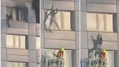 Imagini dramatice! O femeie se aruncă de la etajul 11 al unui imobil în flăcări în brațele unui pompier aflat pe o autoscară. VIDEO