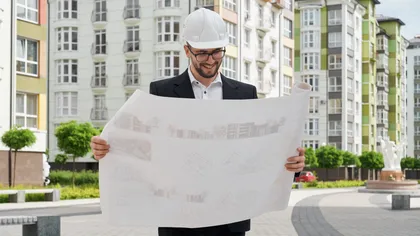 Taxă nouă pentru marii dezvoltatori imobiliari de la finalul lunii august. Banii ar putea merge la drumuri, şcoli, creşe și utilități