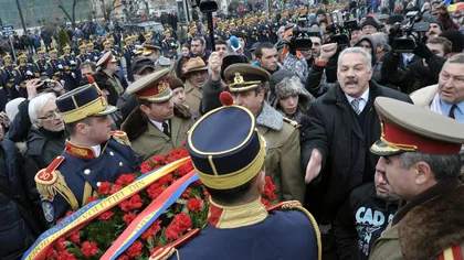 Băsescu, Boc şi Oprescu interzişi de revoluţionari la ceremonia din Piaţa Universităţii. FOTO