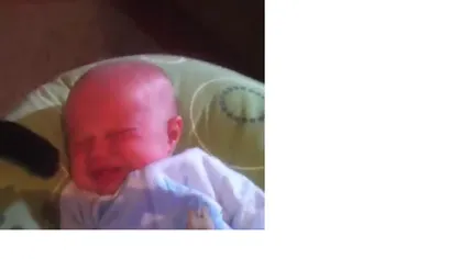 Cum linişteşte o pisică un bebeluş care plânge VIDEO