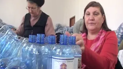 Arhiepiscopia Tomisului pregăteşte 70.000 de sticle cu apă sfinţită, de Bobotează