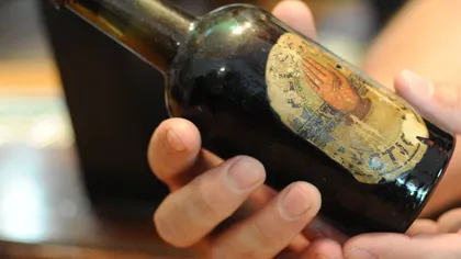 Cea mai veche sticlă bere din lume se vinde pentru 155.000 de dolari