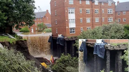 INCREDIBIL! Inundaţiile din Marea Britanie au lăsat un bloc întreg fără fundaţie