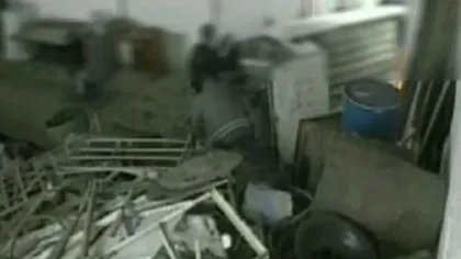 Imagini din atelierul hoţilor de Dacii. Infractorii dezasamblau maşinile şi vindeau piesele VIDEO