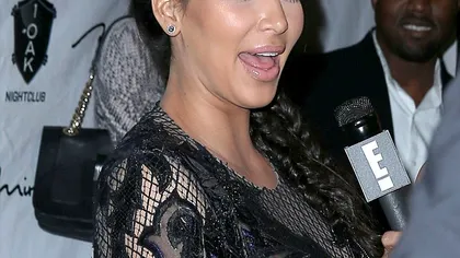 Kim Kardashian, sexy în dantelă transparentă, la o zi după ce a anunţat că e însărcinată FOTO