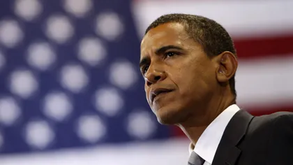 FOTOGRAFIE CONTROVERSATĂ: Barack Obama, surprins în timp ce trage cu puşca