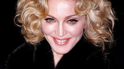 Madonna a pozat goală cu noul ei parfum FOTO
