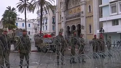 Confruntări violente în Tunisia, cu prilejul funeraliilor unuia dintre liderii opoziţiei VIDEO