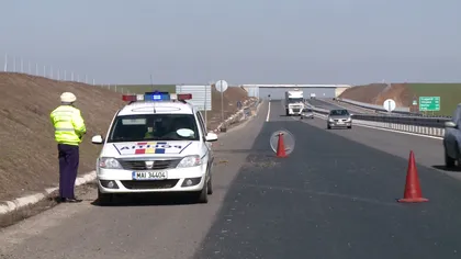 Un drum din Sibiu a fost blocat cu două TIR-uri pentru prinderea unui hoţ de maşini