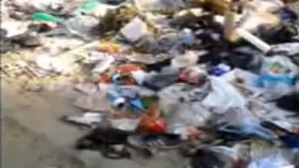 ŞTIREA TA: O groapă de gunoi în mijlocul străzii, în Sectorul 5, locuită de drogaţi VIDEO