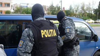 PERCHEZIŢII în Alba: Un şef de poliţie din Alba Iulia, acuzat că sprijinea un grup infracţional